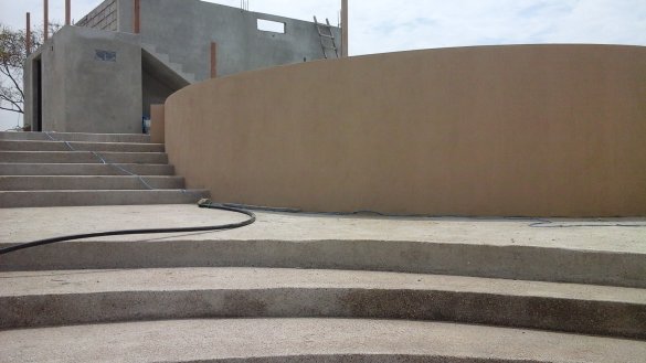 Stairs and patios near pool